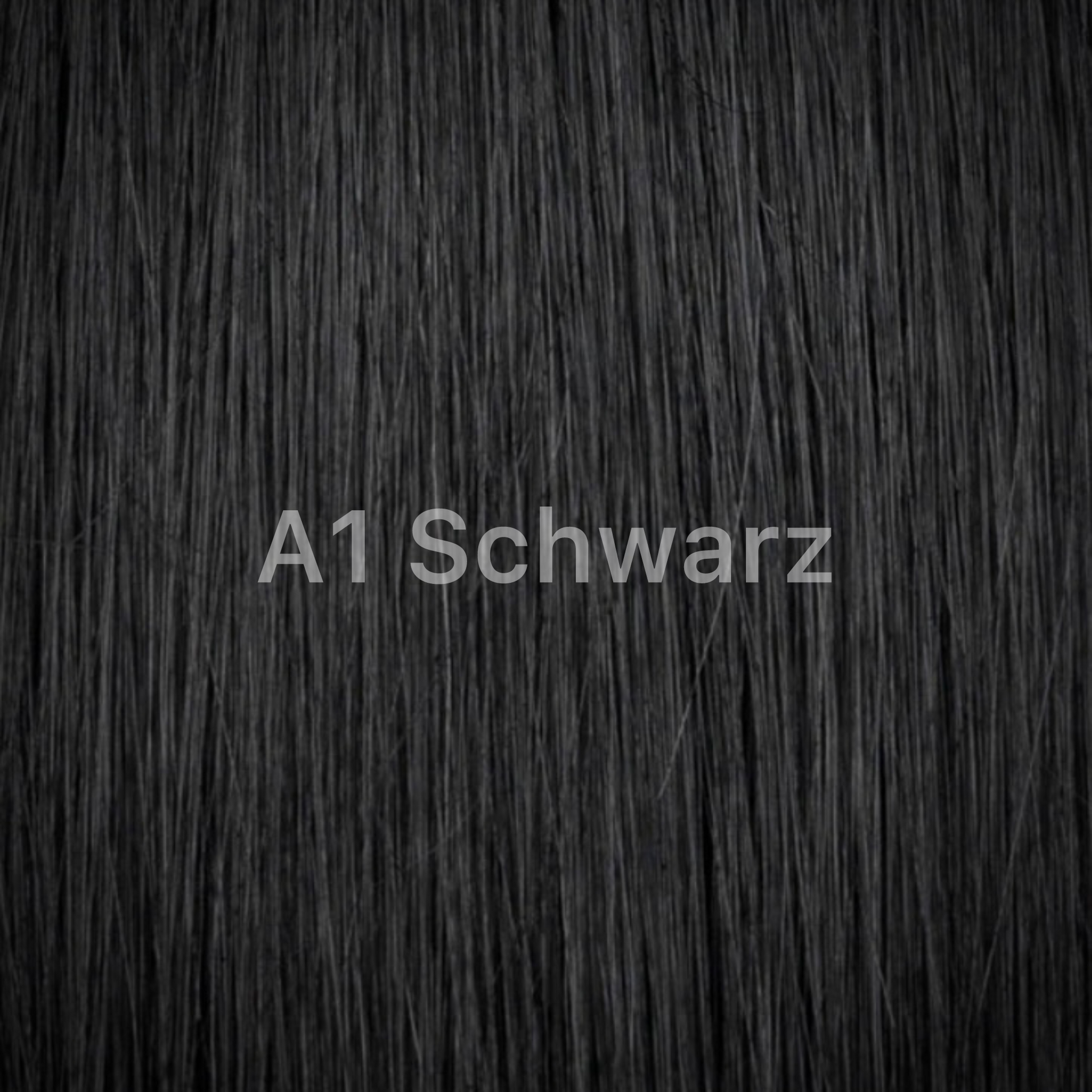lockige Echthaar-Extensions 65cm in A1 Schwarz Farbton