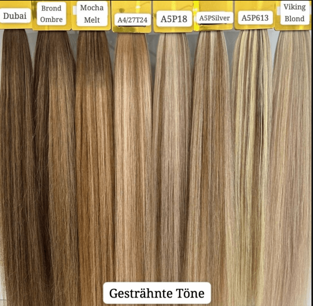 Gesträhnte Töne von VIP Haarverlängerung natürliche Welle in verschiedenen Farben wie Dubai, Brond Ombre und Viking Blond.