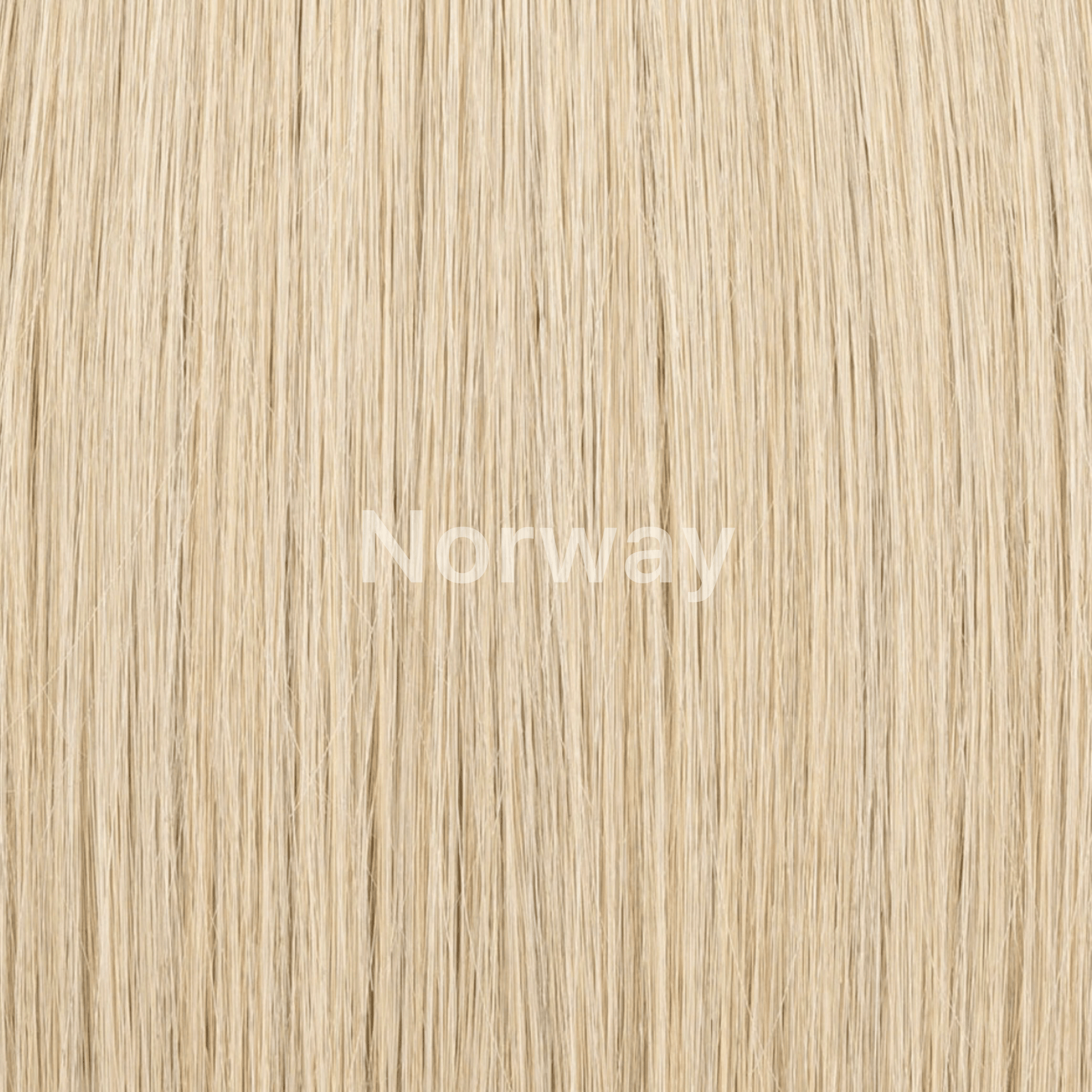 lockige Echthaar-Extensions 65cm in hellem Farbton, ideal für stilvolle Haarverlängerungen.